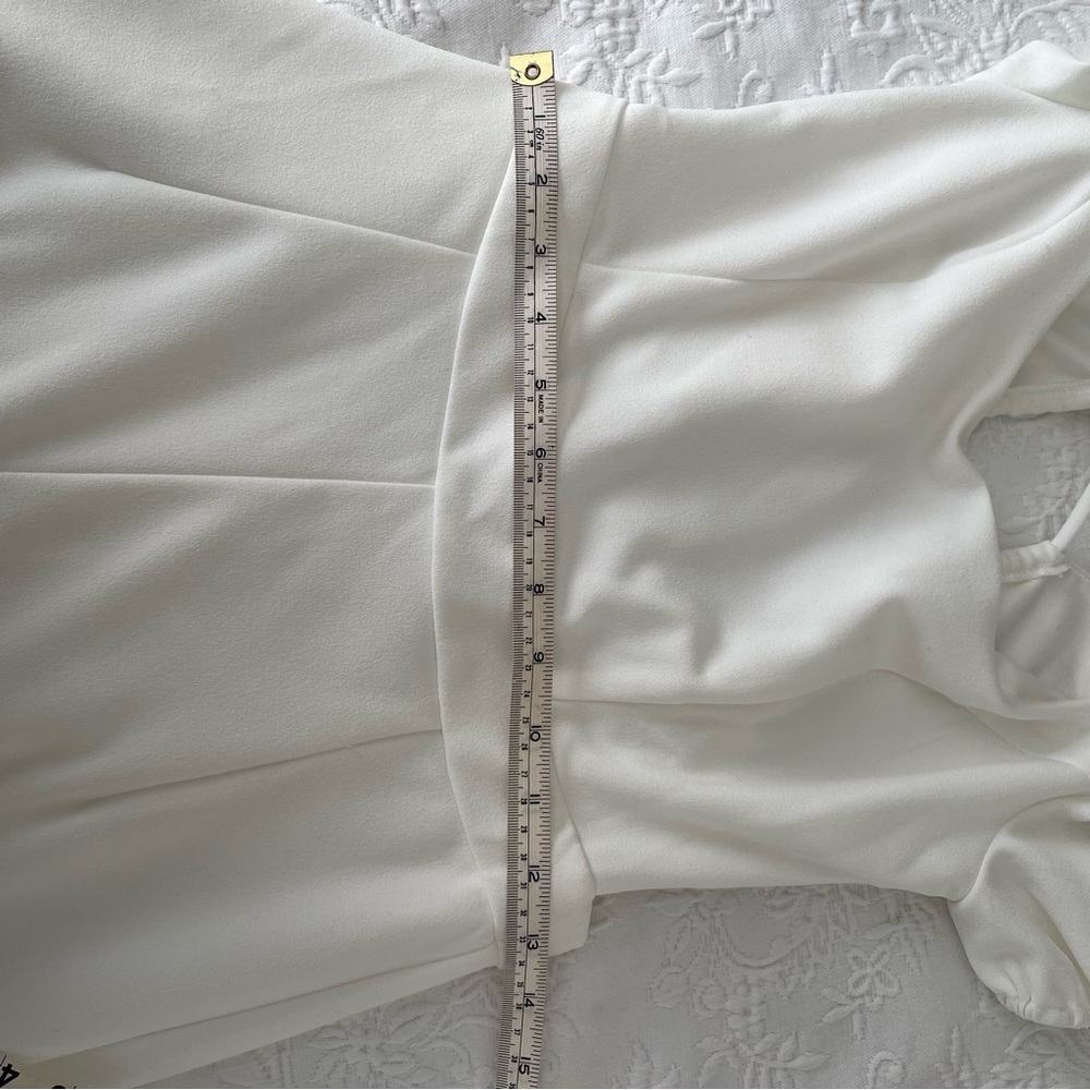 With A Puff Lulus white jumpsuit - Picture 7 of 9